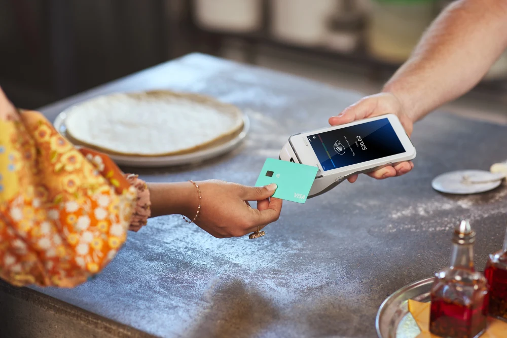 Pizza merchant receiving visa debit contactless payment success