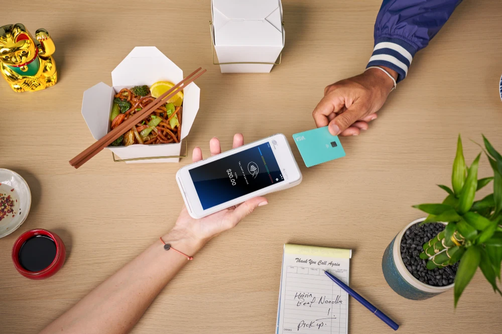 Takeaway merchant receiving visa debit payment